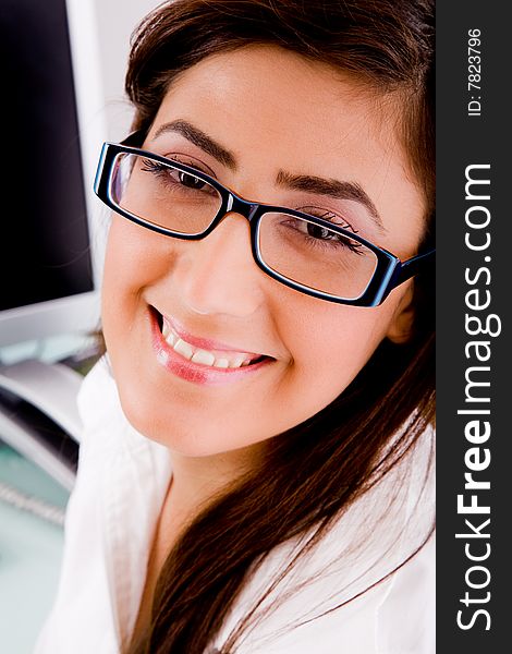 Close view of smiling female with eyewear with white background. Close view of smiling female with eyewear with white background
