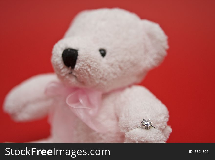 Valentine's Day symbols, teddy bear and ring