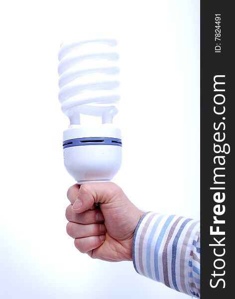 Hand holding energy save light bulb, white background. Hand holding energy save light bulb, white background