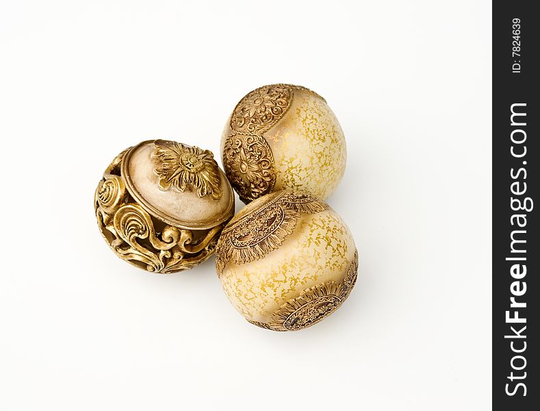 Gold classic spheres on white background. decorative elements