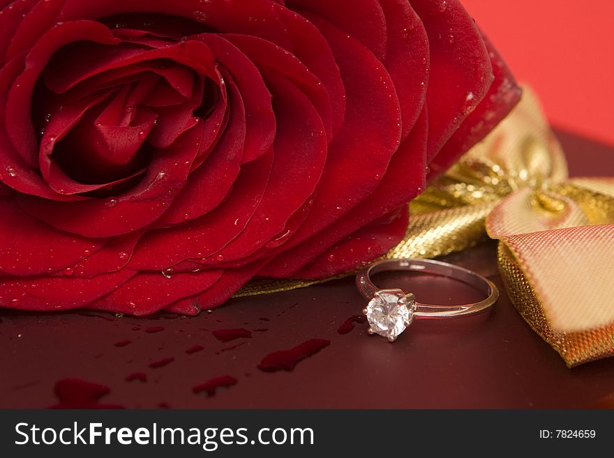 Valentine's Day symbols, rose, ring and gift