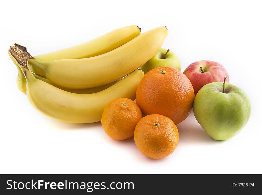 A group of common fruit isolated against a white background. A group of common fruit isolated against a white background