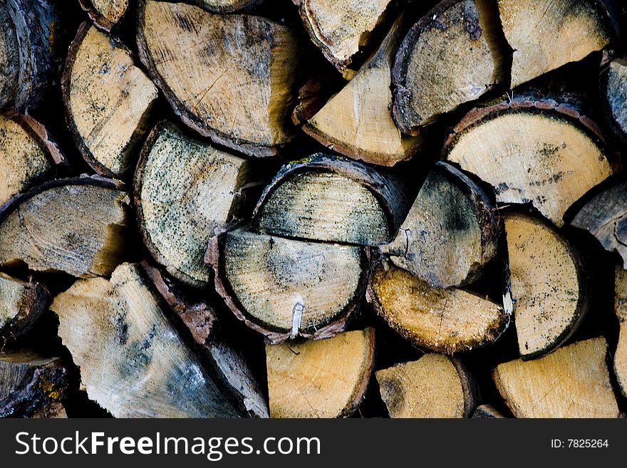 Pile of firewood, stacked for winter. Pile of firewood, stacked for winter