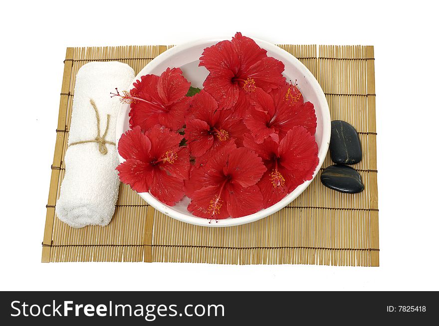 Red flowers in vase with stones. Red flowers in vase with stones