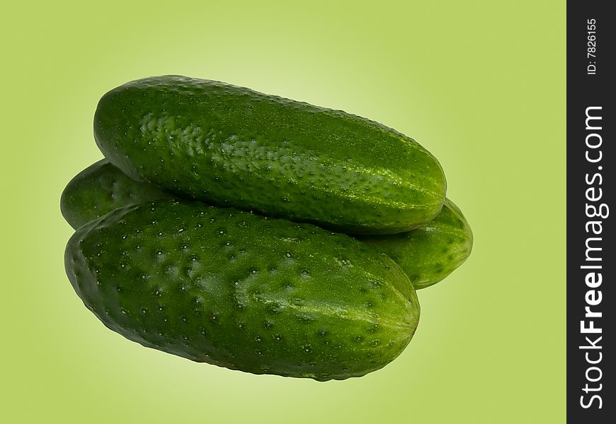 Cucumbers fresh on a green background. Cucumbers fresh on a green background