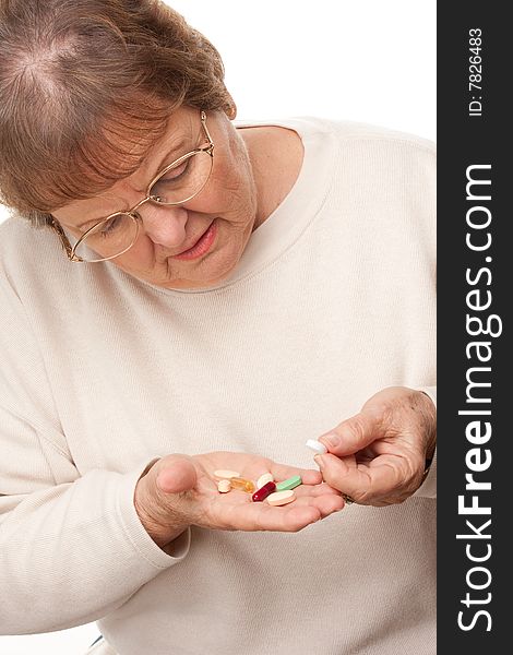 Attractive Senior Woman and Pills