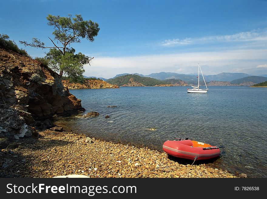 Anchoring yacht at beautiful coast in mediteranian sea. Anchoring yacht at beautiful coast in mediteranian sea