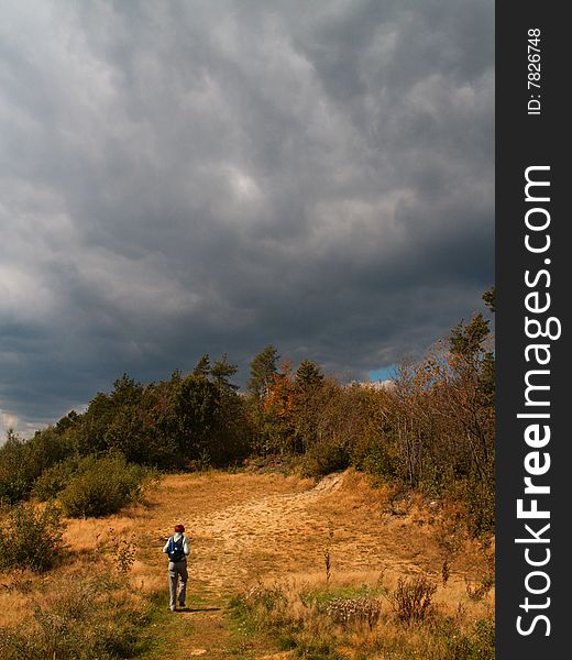 Solitaire hiker on a mountain path