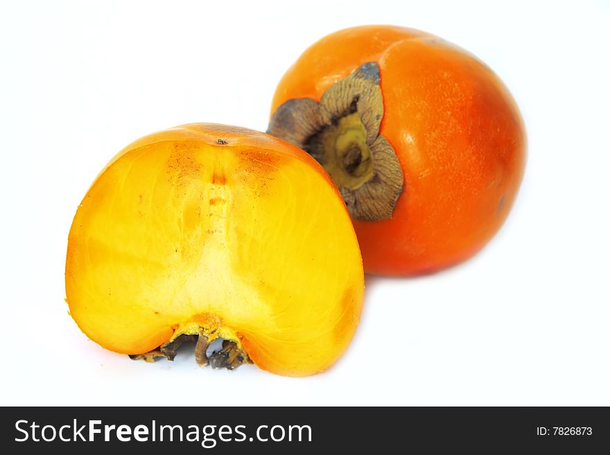 Sweet orange persimmon on a white background