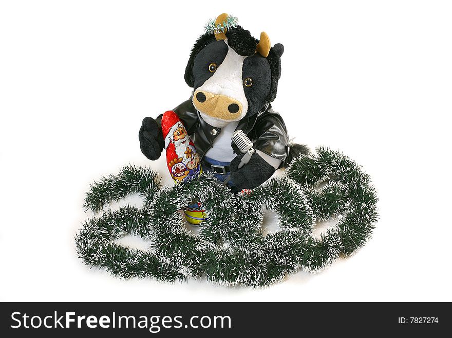 Singing Toy Bull Holding Chocolate Santa Claus and The Xmas Tree Adornment Arranged as 2009. Singing Toy Bull Holding Chocolate Santa Claus and The Xmas Tree Adornment Arranged as 2009