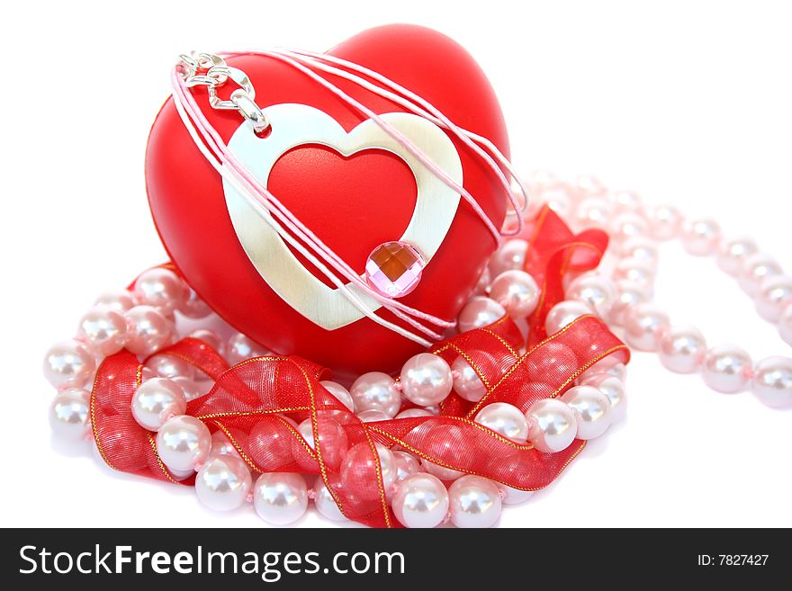 Valentine hearts,red ribbon,pink pearls on white background.