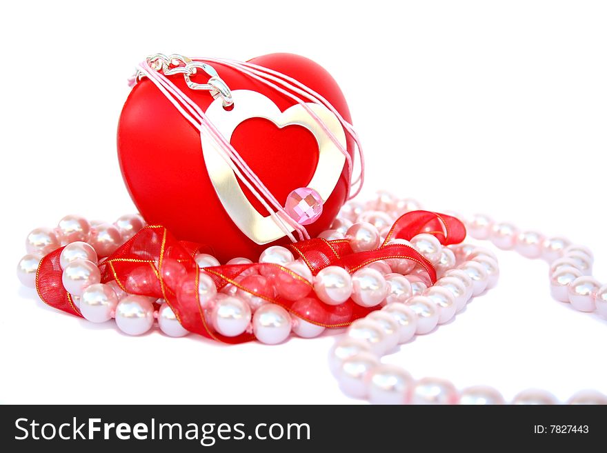 Valentine hearts,red ribbon,pink pearls on white background.