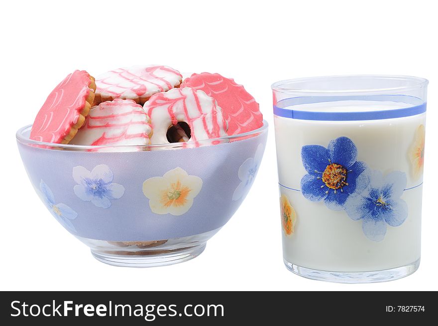 Tasty cake in dish near glass with milk on isolated background