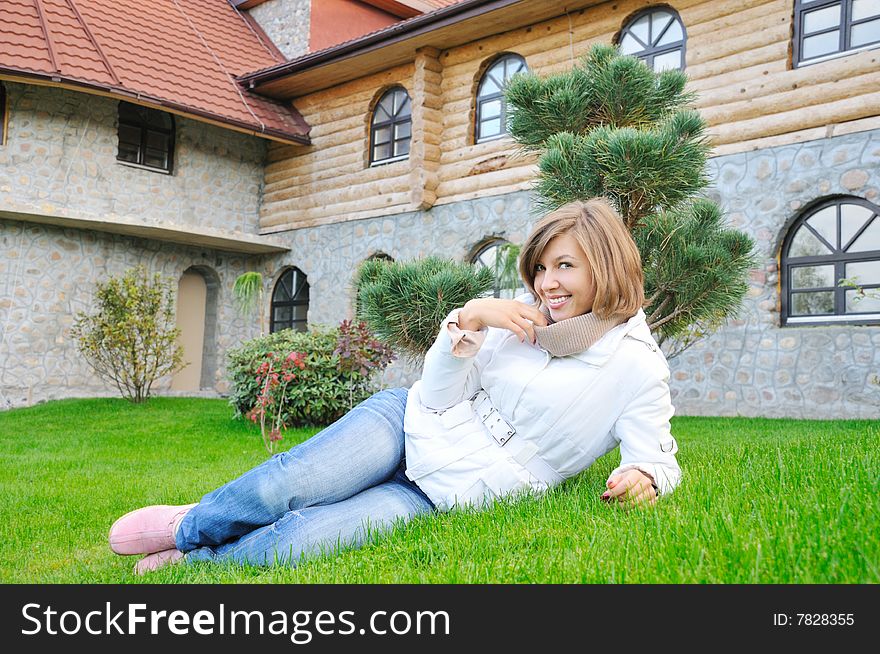 Nice smiling girl lie on grass. Nice smiling girl lie on grass