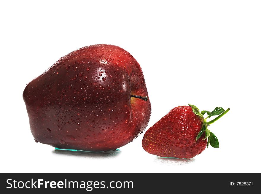 Strawberry with red ripe apple