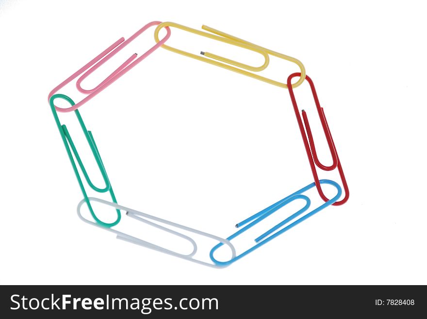 Few colored paperclips on white background 2. Few colored paperclips on white background 2