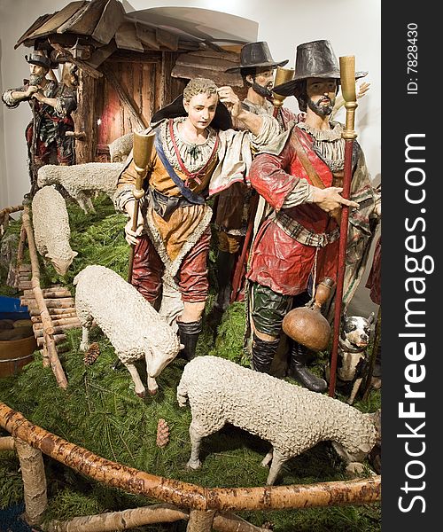 Baroque Bethlehem in Prague - shepherd and rustic people with sheep. 48 figures Bethlehem made in 17th century by monk Kaspar. Artwork from straw, paper, gypsum and original clothes.