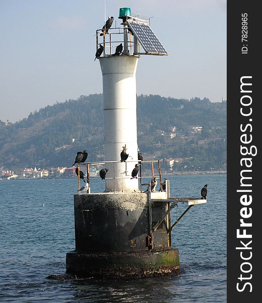 The little lighthouse locaded in the middle of the Bosphorus, you can see the Asian shore