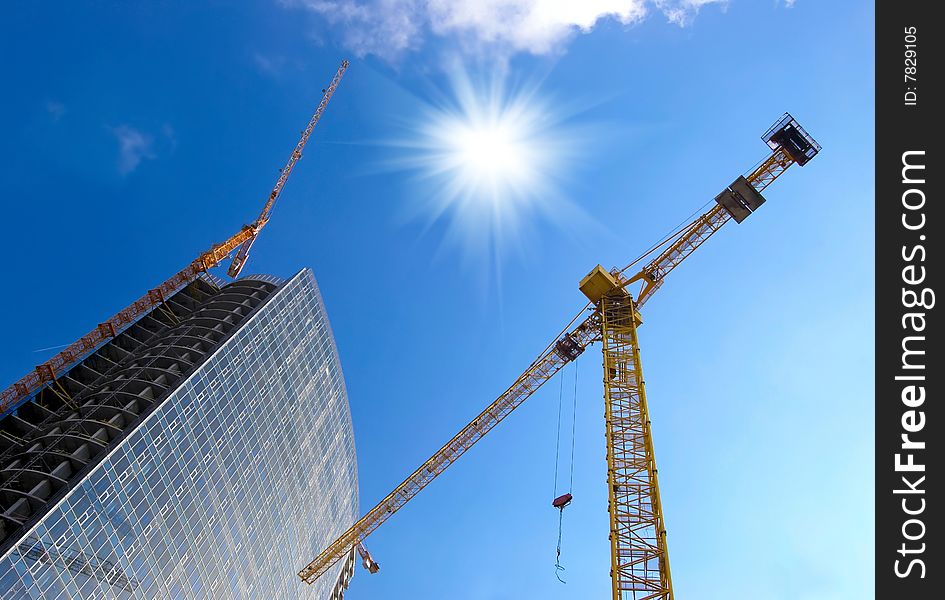 Construction work site on blue sky background