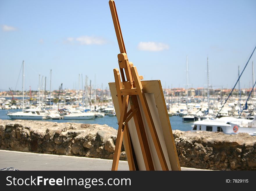 Picture or menu easel with background of harbour