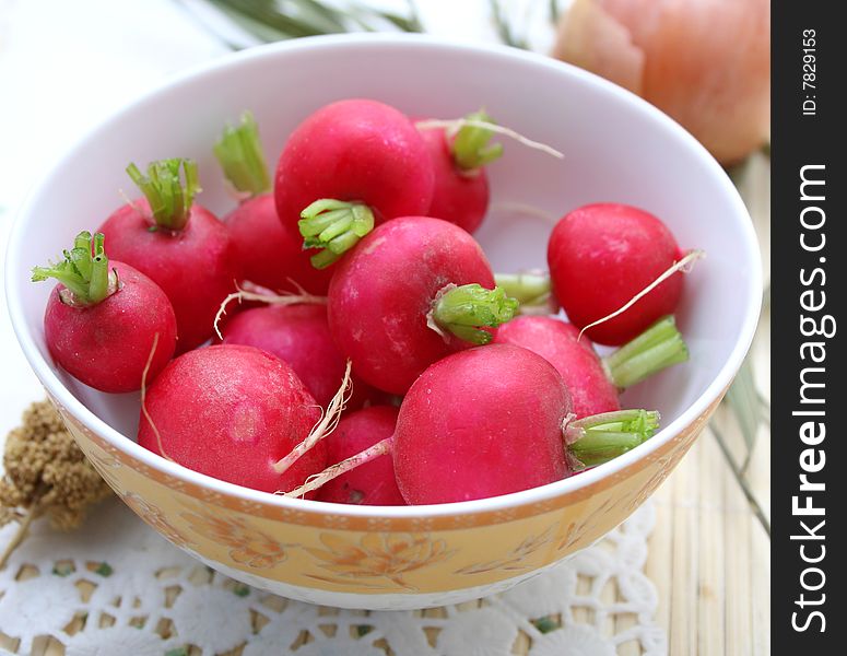 Some fresh red radish in a bowl