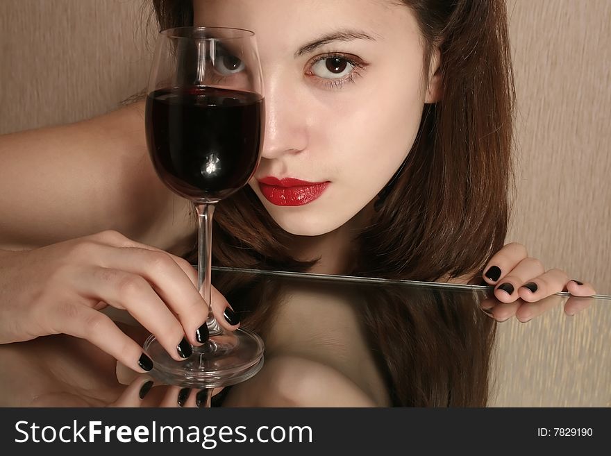 Portrait of the girl with a glass of wine. Portrait of the girl with a glass of wine.