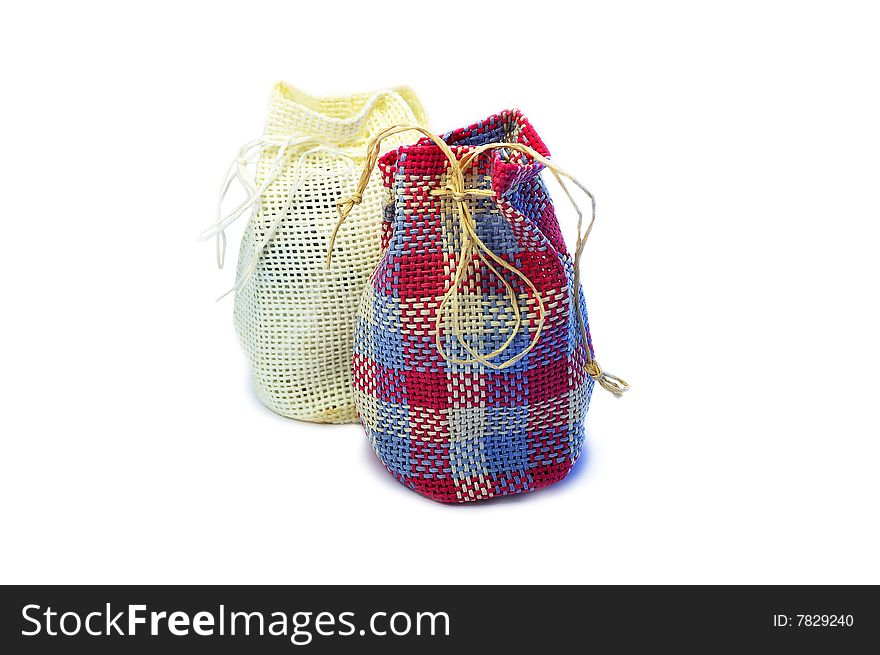 Pair of traditional country styled gift bags isolated on white background. Pair of traditional country styled gift bags isolated on white background