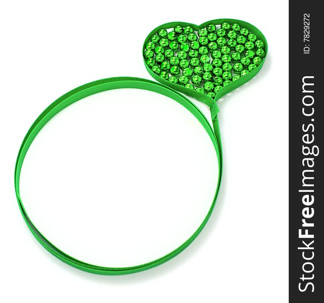 Green tape heart on white with beads