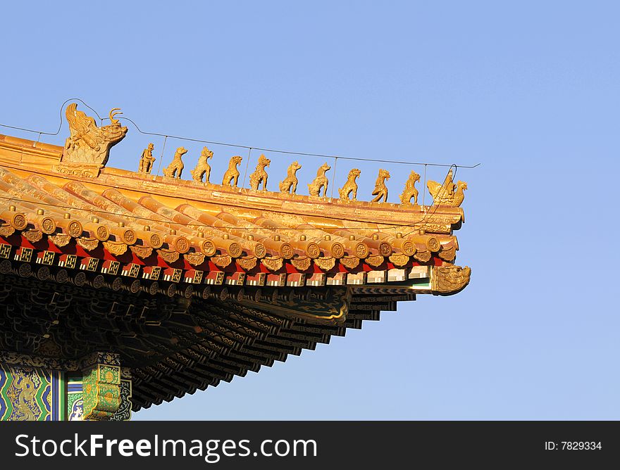 Royal Golden Roof and Holy Animal Ornament on The Imperial Palace (Gu-gong is Chinese Name as well-known). Royal Golden Roof and Holy Animal Ornament on The Imperial Palace (Gu-gong is Chinese Name as well-known)