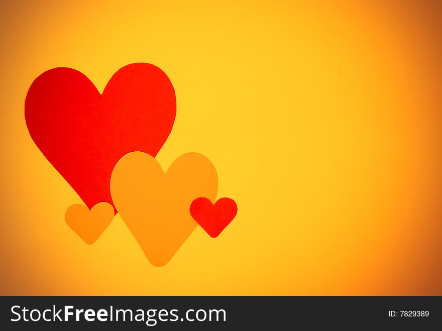 Red and yellow romantic hearts background