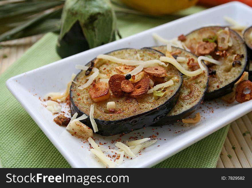 Some fresh aubergines with garalic and cheese
