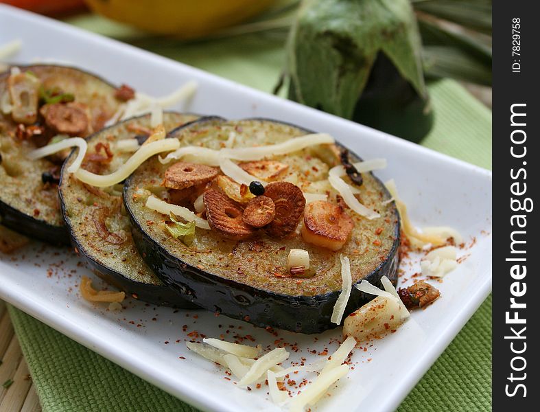 Some fresh aubergines with garalic and cheese