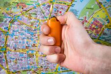 Hand With Lighter Over Map Stock Image Hand With Lighter Over Map Stock Image