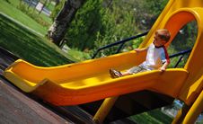 Child Sliding Royalty Free Stock Photography Child Sliding Royalty Free Stock Photography