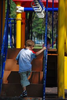 Child In Playground Stock Image