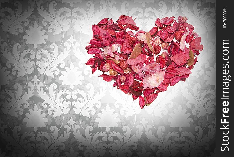 Heart made of petals of roses on the Renaissance background