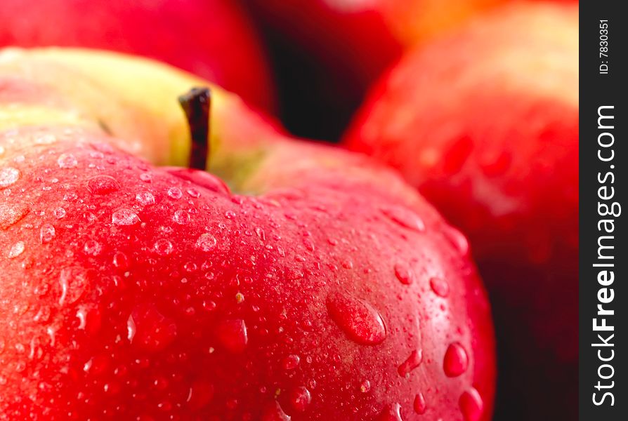 Close-up of red apples with water drops