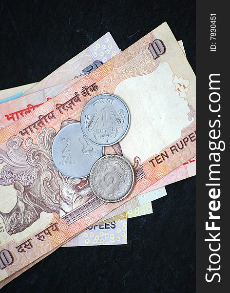 Indian Currencies on black background. Indian Currencies on black background.