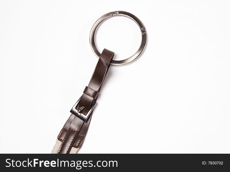 Leather belt with a metal ring. Isolated on white. Leather belt with a metal ring. Isolated on white.