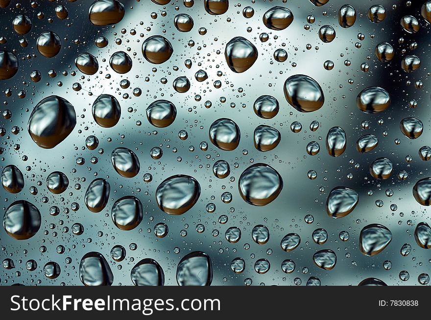 Water droplets on glass background