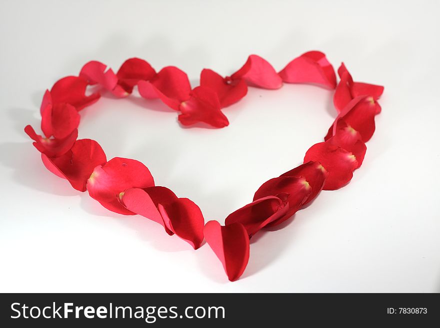 Valentines heart of red rose petals