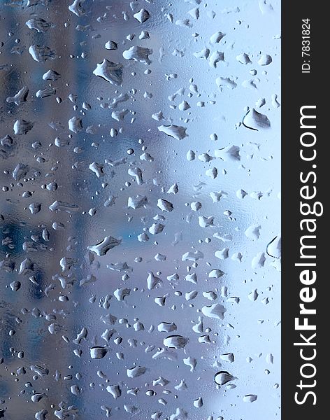 Raindrops on the glass background