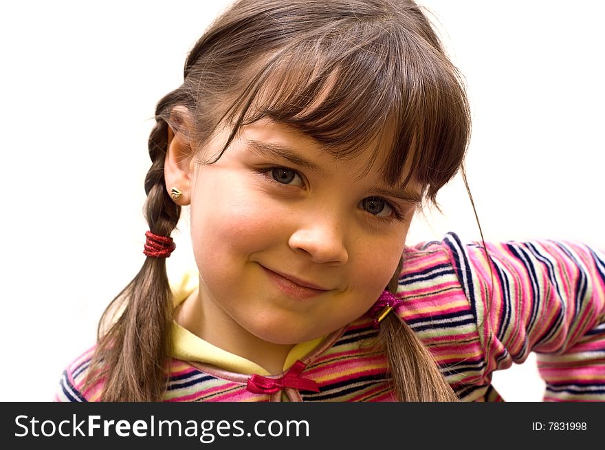 Closeup portrait of a young happy girl looking at you. Closeup portrait of a young happy girl looking at you.