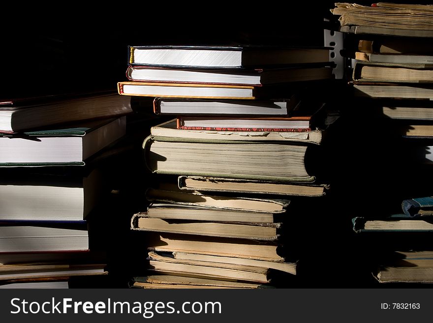 Piles of books in library. Piles of books in library