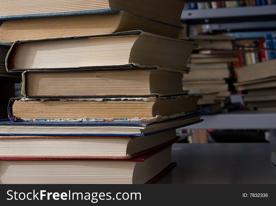 Piles of books in library. Piles of books in library