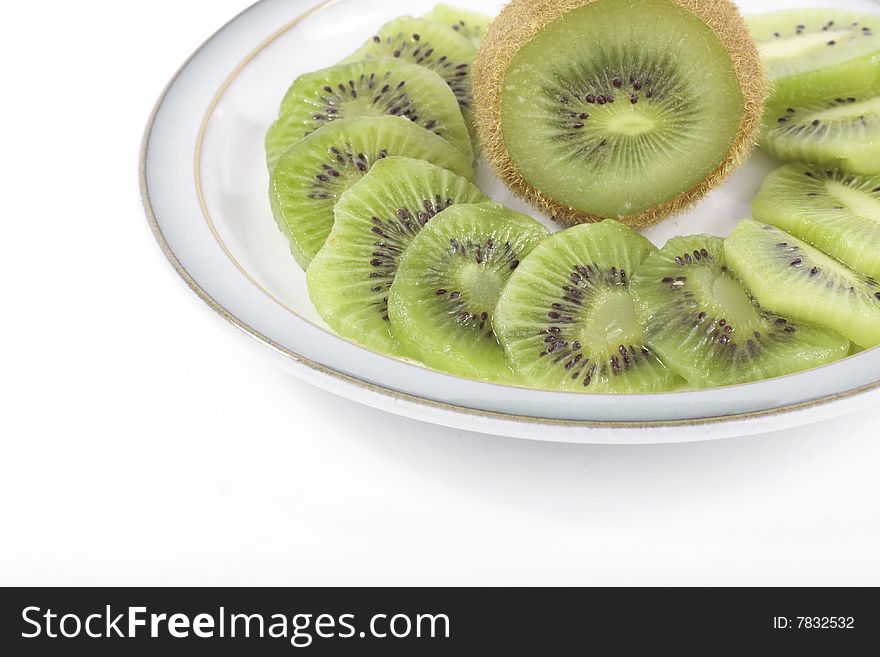 Kiwi Fruit Slices On Saucer