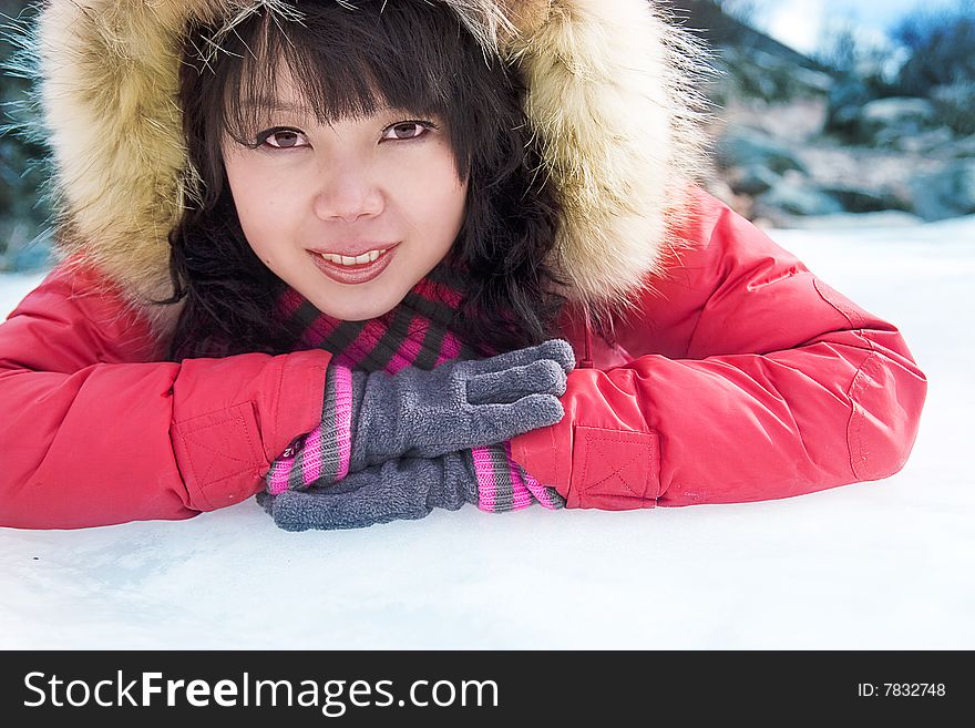 Beautiful girl and snow landscape