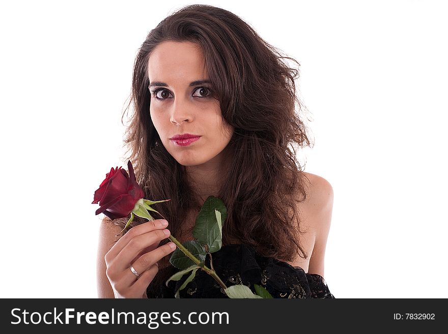 Elegant woman with rose on hand