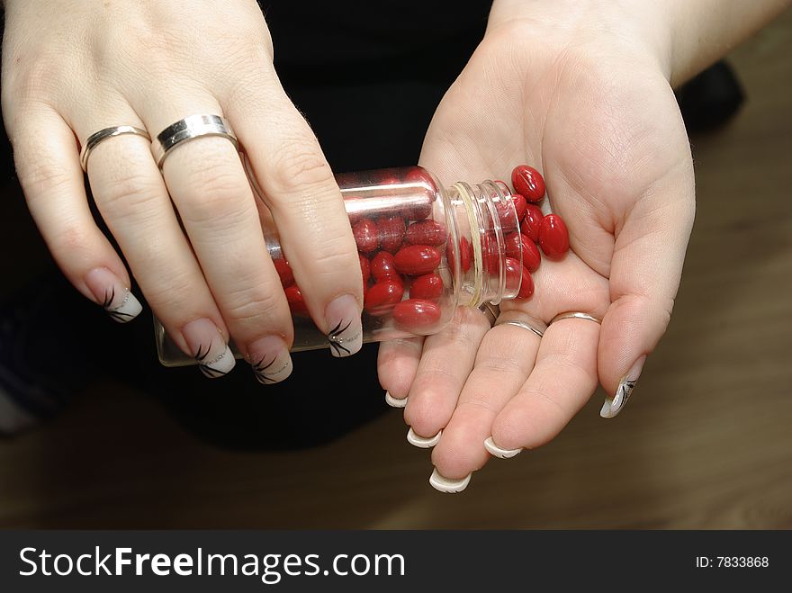 Pills being poured into hand. Pills being poured into hand