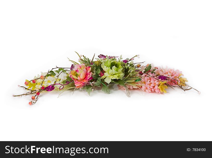 Photo of bouquet of artificial flowers isolated on white background